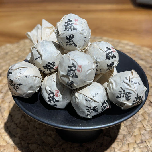From YiWu Mountain "mahei"(麻黑) raw(sheng) Pu 'er dragon beads