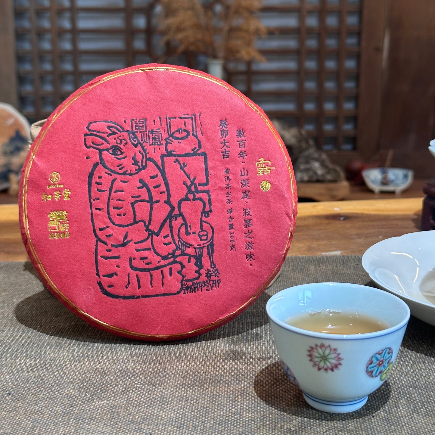 2022 Pasha Xiniutang Sheng Pu’er Tea Cake · 200g