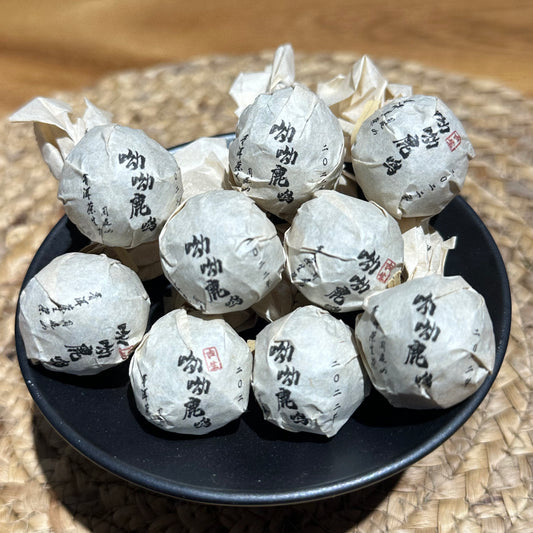 From kun lu Mountain "youyouluming”（呦呦鹿鸣） raw(sheng) Pu 'er dragon beads